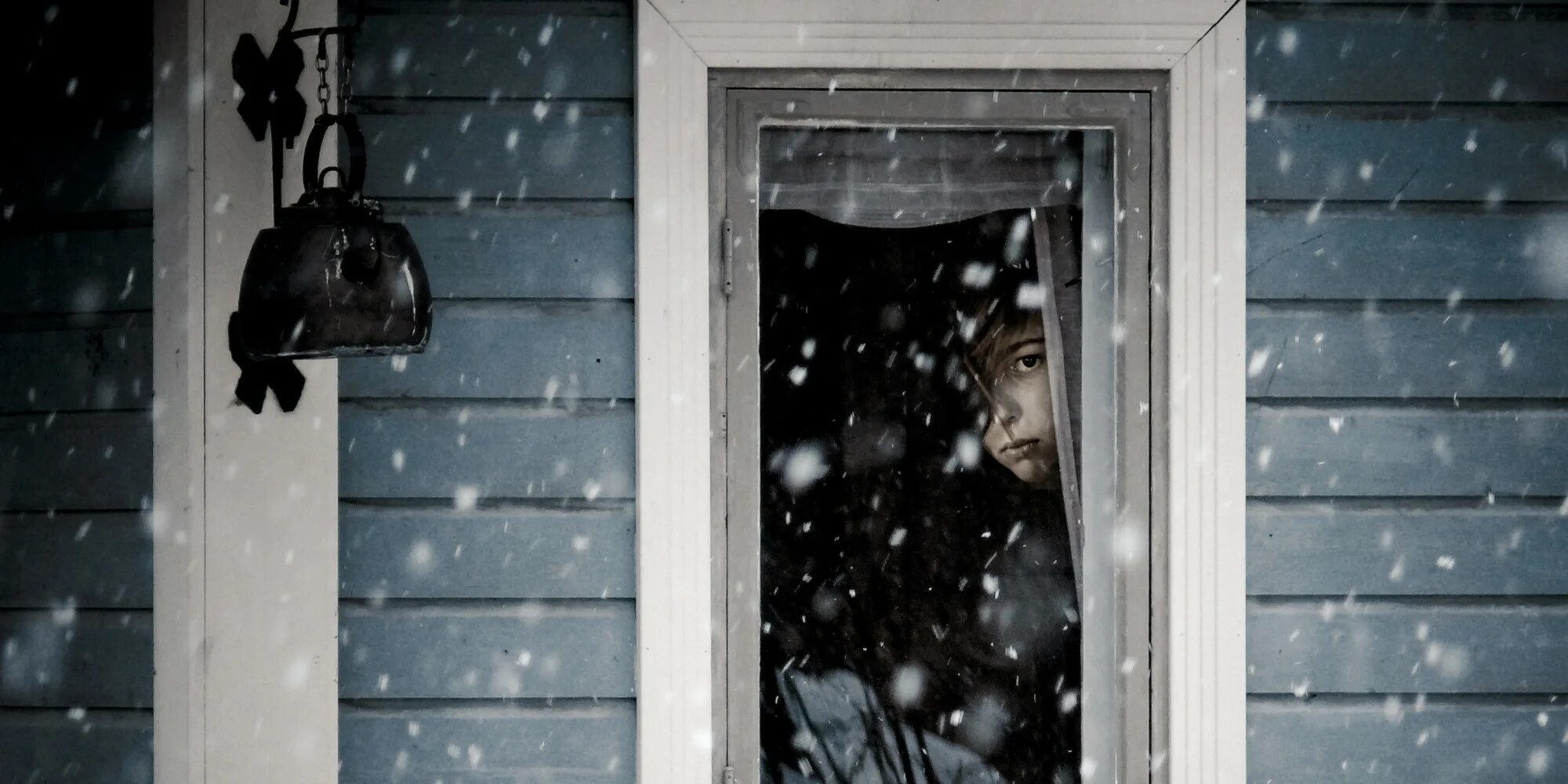 Sam is by the window