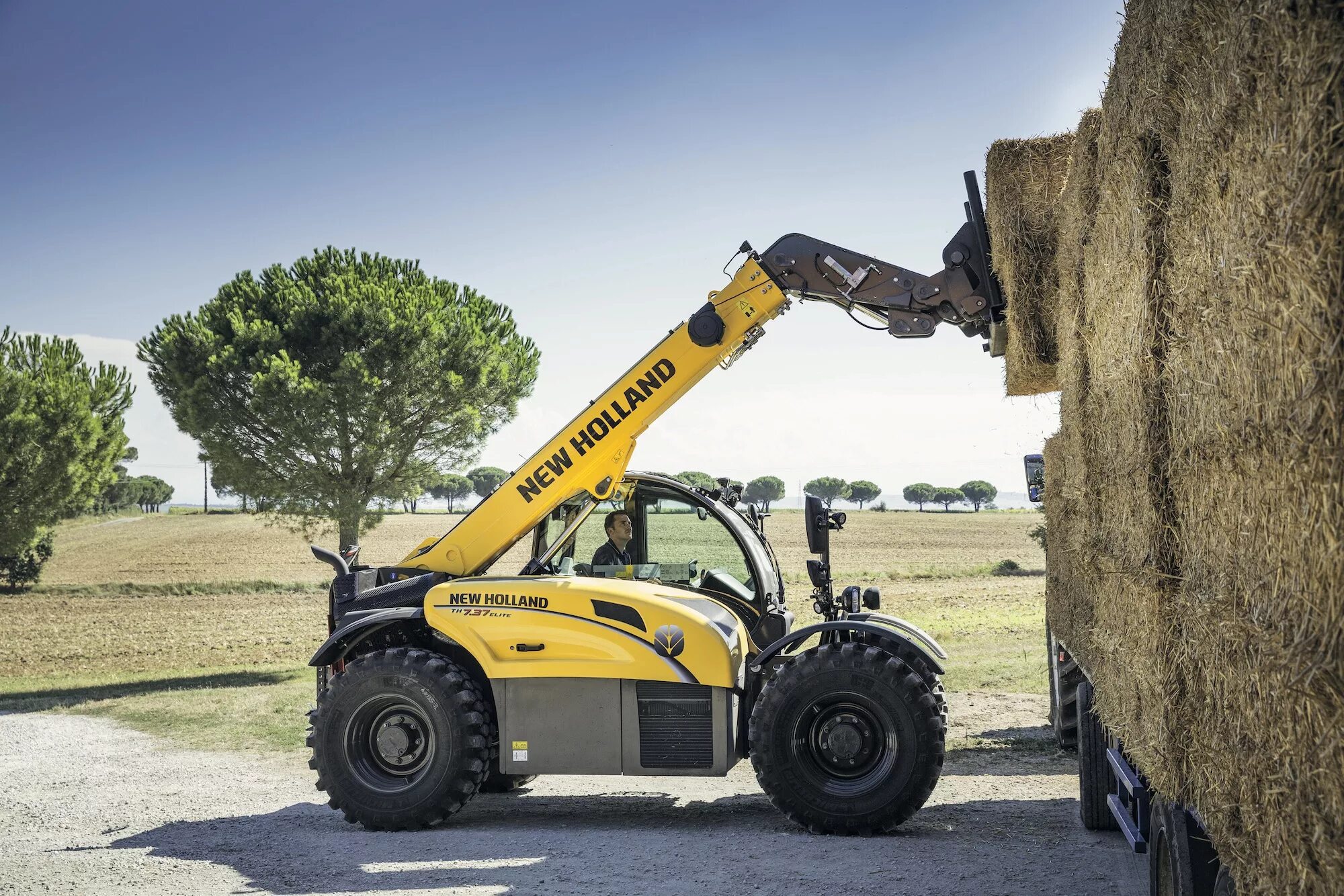 Фронтальный погрузчик нью холланд. Holland погрузчик. Погрузчик new holland b115b. Мини-погрузчик new holland l318. Экскаватор-погрузчик new holland b115.