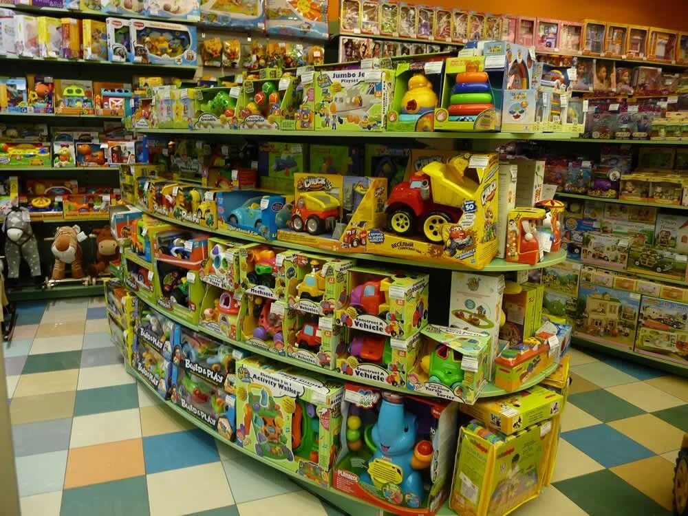 ассортимент игрушек. магазин игрушек. детские магазины город. детские магазины город. оборудование для магазина детской одежды.