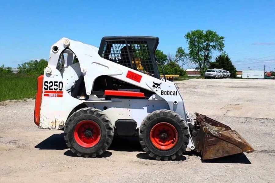 Bobcat s250. Мини погрузчик Bobcat s250. Мини погрузчик Бобкэт 250. Мини погрузчик Бобкэт s300. Bobcat s250 Turbo.