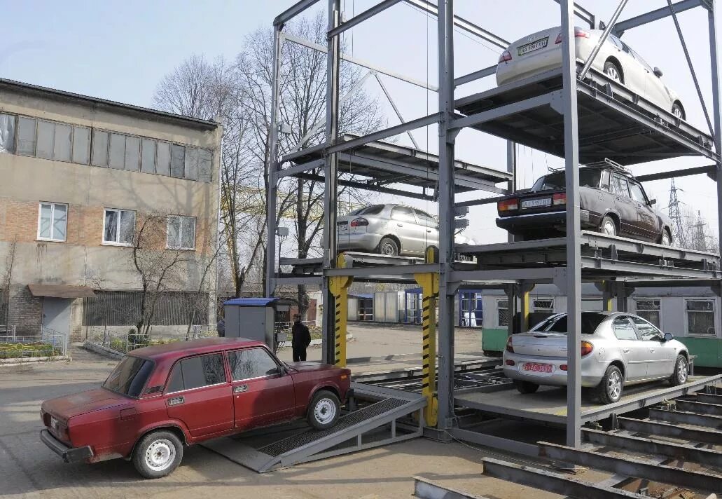 Двухуровневые парковки для автомобилей. Механизированные парковки. Двухэтажная парковка. Многоярусный автоматический паркинг. Двухуровневые парковки для автомобилей.