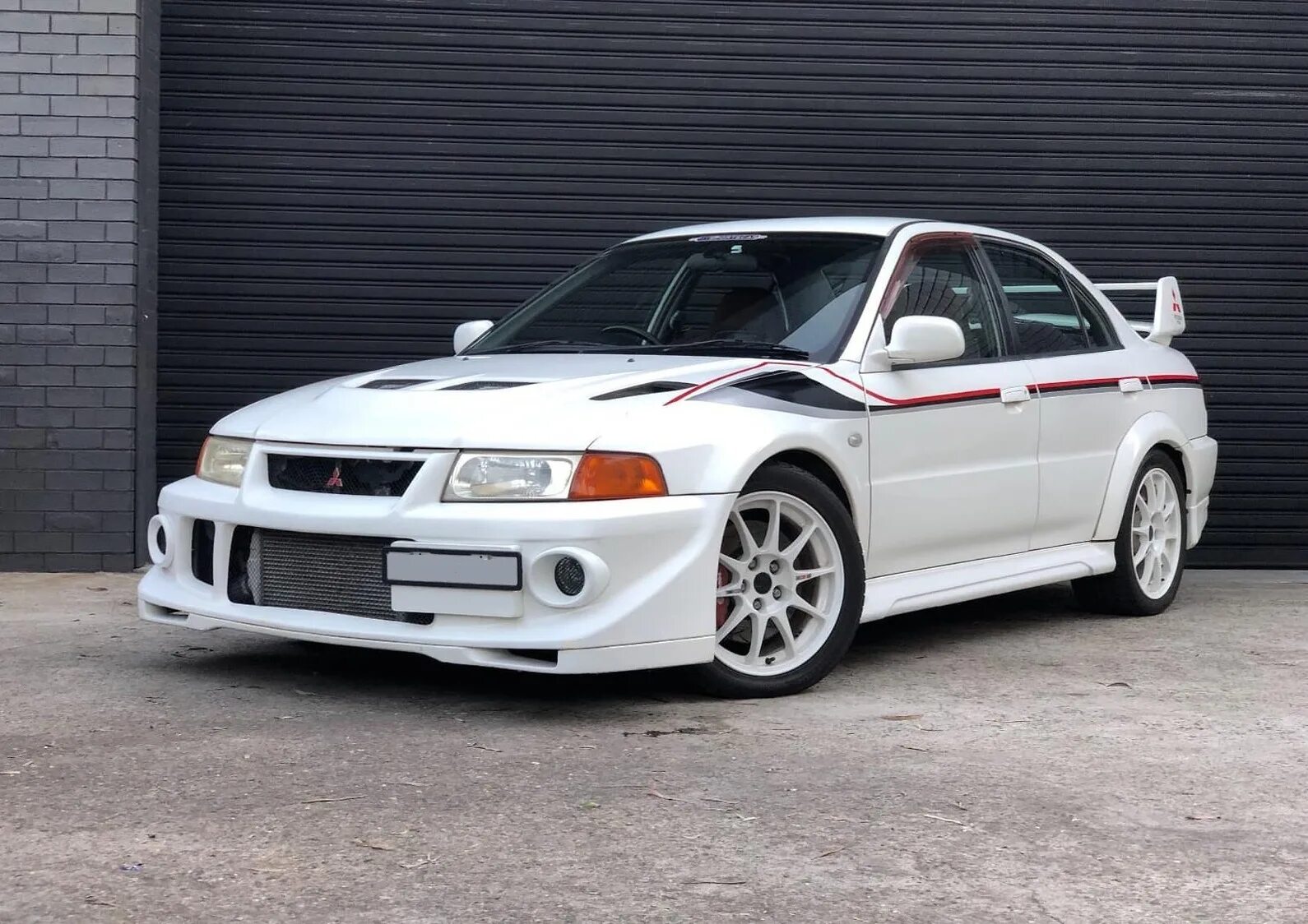 Мицубиси лансер 6 поколение. Mitsubishi evolution 6. Lancer evo 6 tme. Mitsubishi lancer evolution 6 green. Mitsubishi lancer evolution tme.