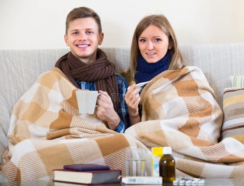 Under pair. A pair of tiktok under a blanket.