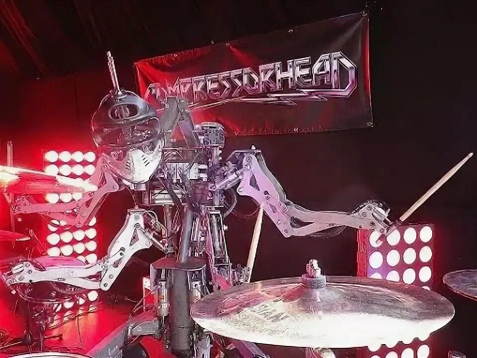Музыкальная группа роботы. Группа compressorhead. группа роботов музыкантов. музыкальная рок группа роботов. робот-барабанщик.