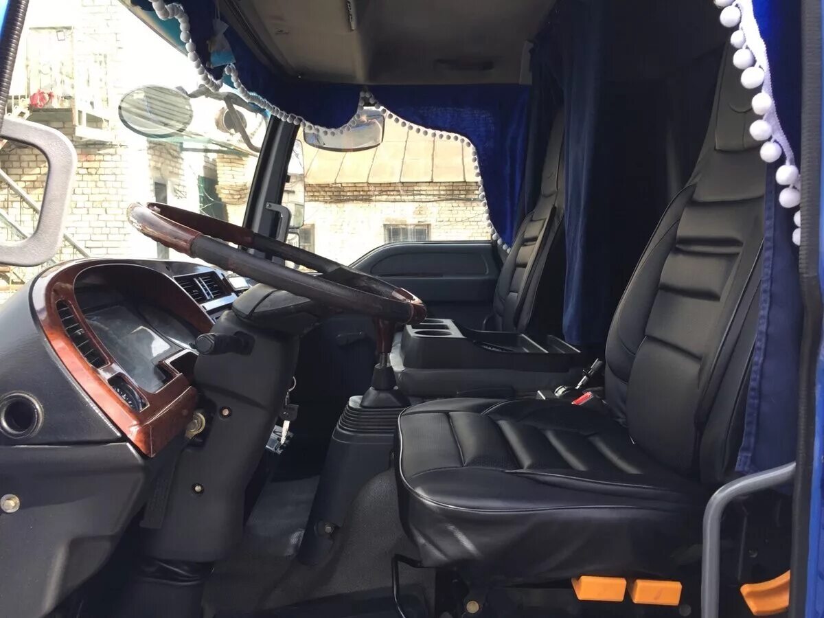 Foton aumark. Фотон 1093 кабина внутри. Кабина фотон 1099 со спальником. Фотон аумарк bj1049. Фотон тюнинг.