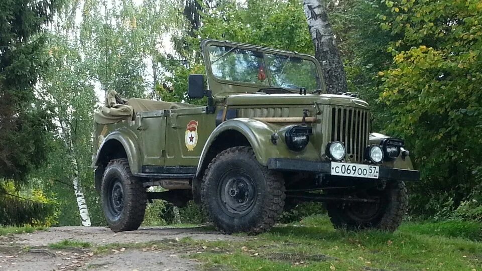Уаз 69 2003. Газ 69 на 38 колесах. Газ 69 голубой. Газ 69 б. Газ 69 багажник.