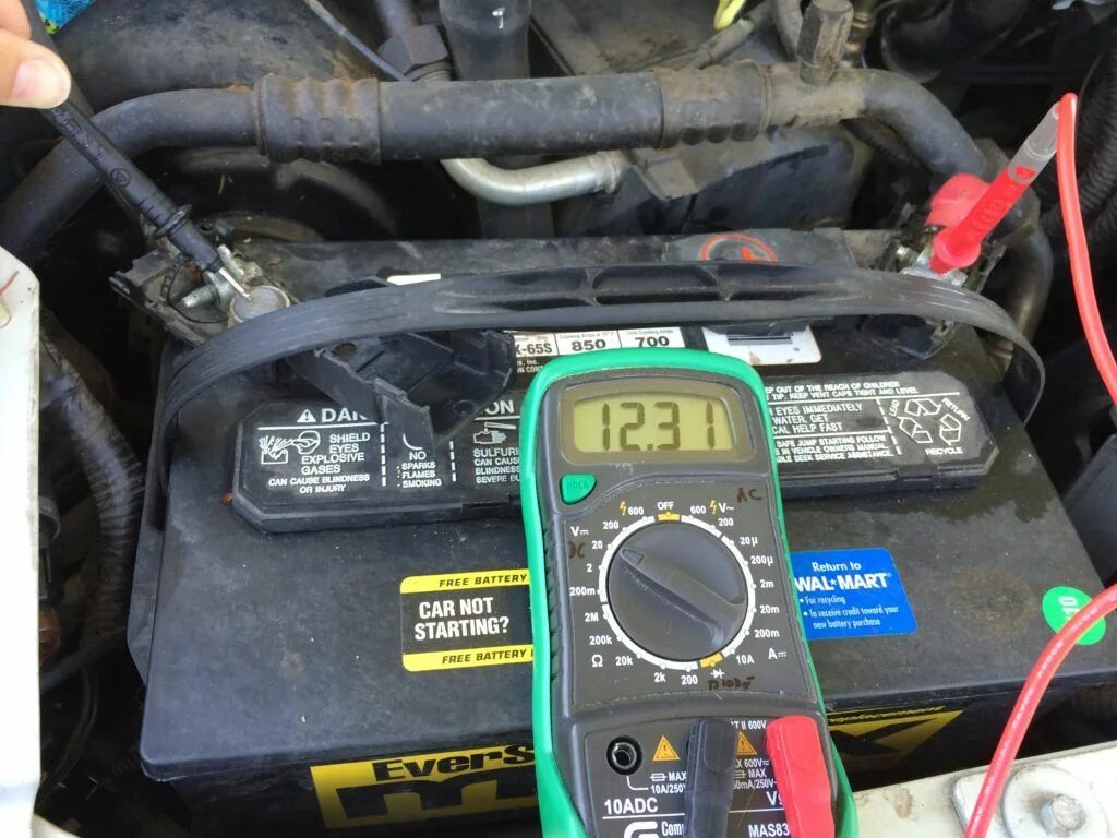 Battery voltage. Car Battery Voltage. How to Test car Battery with Multi Meter. Indicator Battery Voltage ups. How to Repair car Battery White Multimeter.