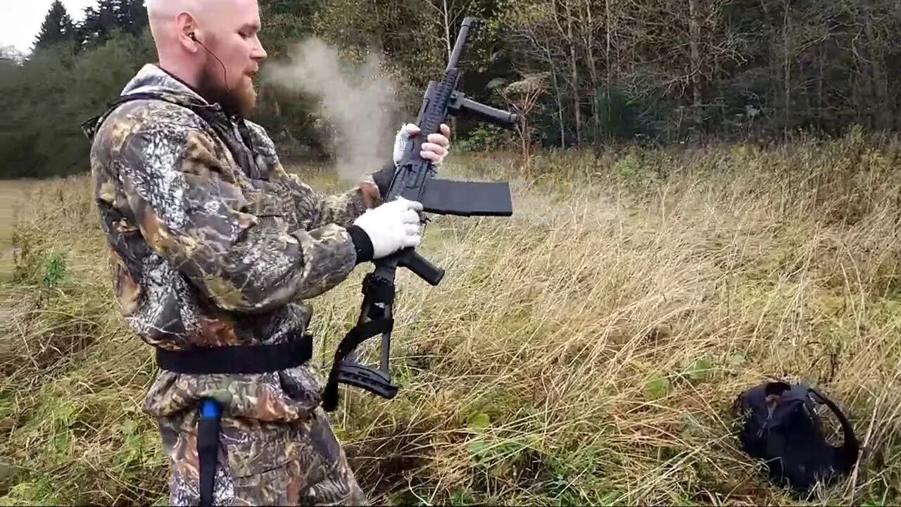 Выстрел из мц 21 12. Сайга охотничья 12 калибра. Перезарядка двустволки. Стрельба 12 калибром. Сайга 12 охотвариант.