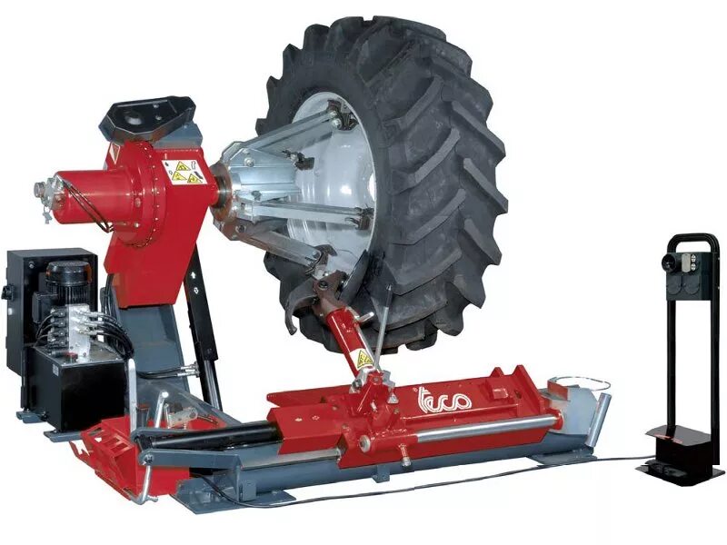 Шиномонтажный станок для грузовых автомобилей и спецтехники. Шиномонтаж грузового колеса. Шиномонтаж грузовых автомобилей. Трактора шиномонтаж. Кольцевые шиномонтаж для спецтехники.