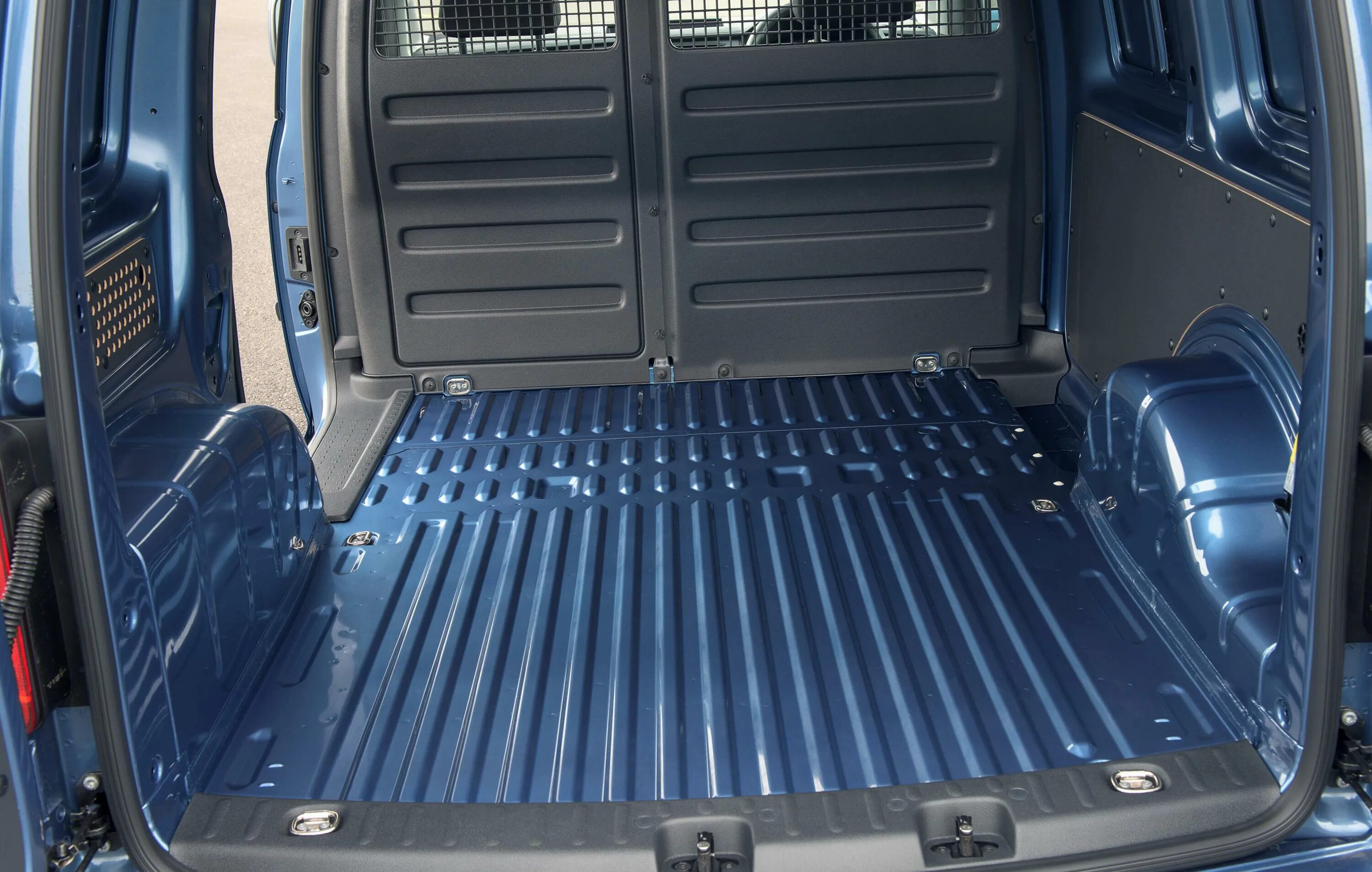 Caddy docker. Volkswagen caddy 2025 багажник. volkswagen caddy kasten багажник. vw кадди макси грузовой отсек. фольксваген caddy kasten.