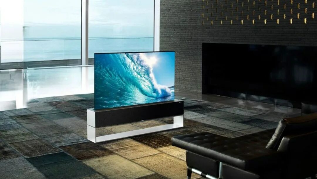 Лучший oled телевизор. Lg signature oled tv r. lg signature oled rollable. lg oled65r19la. телевизор oled lg oled65r19la.