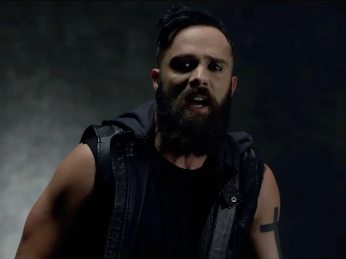 Skillet unleashed beyond. Skillet логотип группы. Skillet feel invincible обложка. Skillet unleashed. Солист скиллет без бороды.