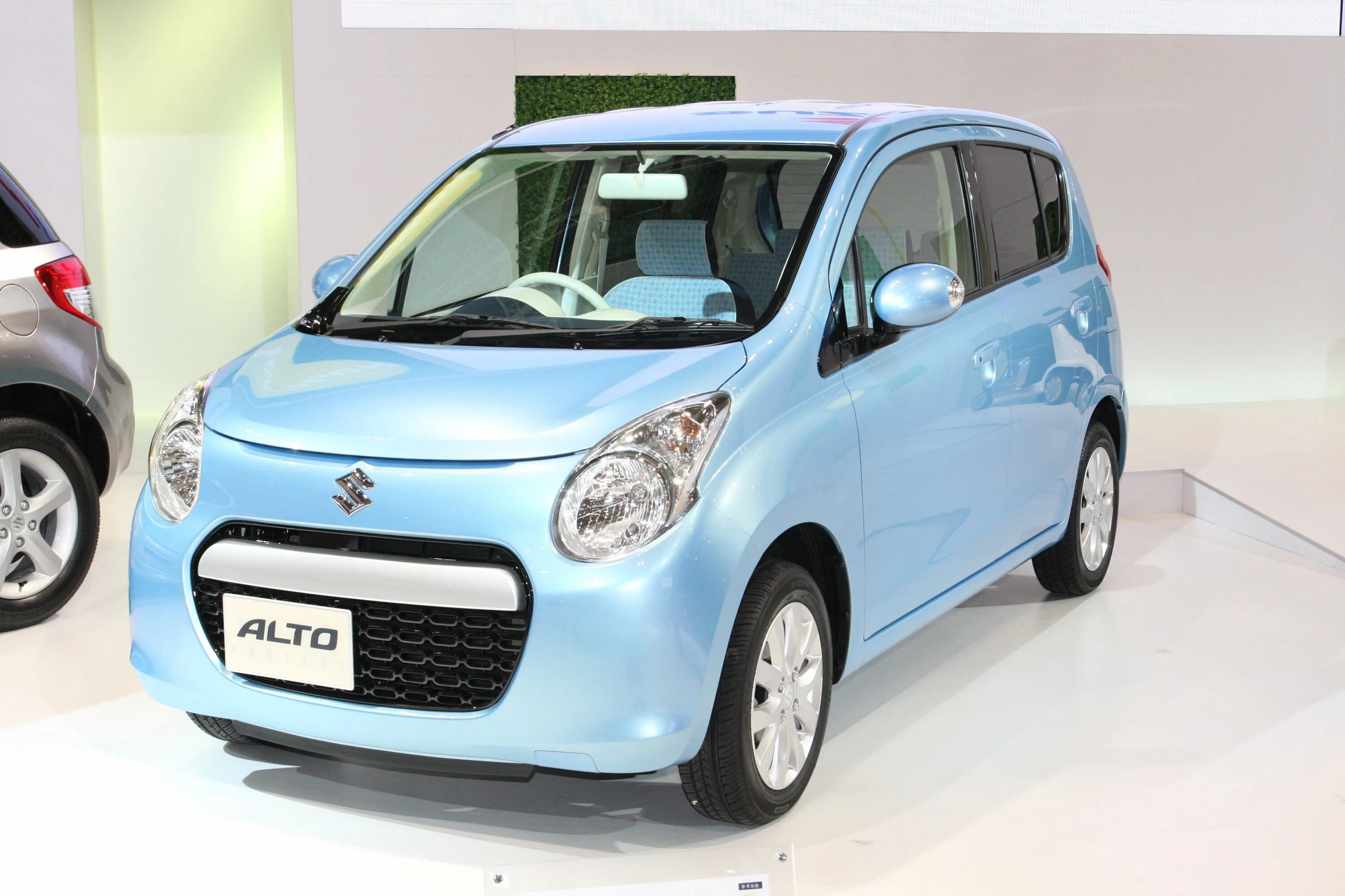 Самый дешевый китайский. Судзуки маленькая машинка. Suzuki Alto Concept. Suzuki Smart 2009. Судзуки маленький.