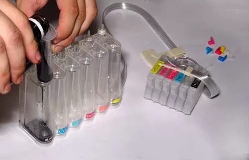 Как заправлять снпч. Как заправлять снпч. Эпсон 100 снпч картридж. Снпч для epson k301. Воздушные отверстия в снпч epson.