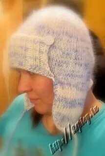 Связанная шапка ушанка спицами женская