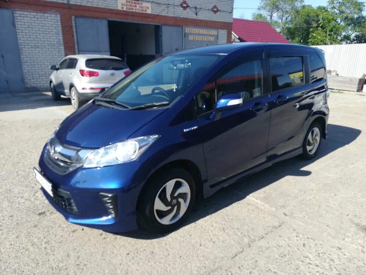 Honda freed 1.5. Honda freed 2015. Honda freed 2015 синий. Хонда Фрид 2015 года. Honda freed синяя.