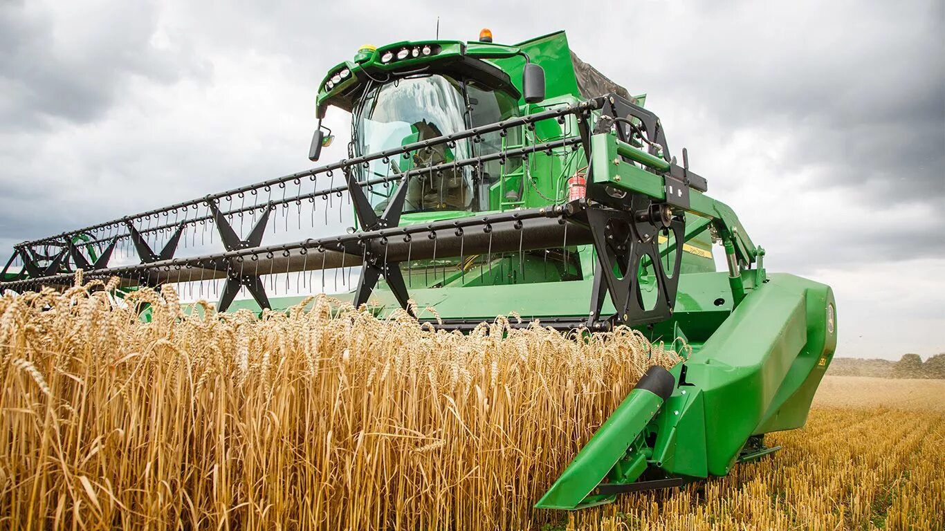уберем зерновых культур. комбайн молотит кукурузу джон дир. уберем зерновых культур. уберем зерновых культур. уборка зерновых культур.