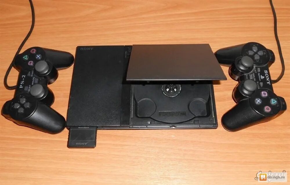 Стоит playstation 2. Sony playstation 2 ps2. sony ps2 mini. ps2 slim. игровая приставка sony playstation 2 slim.