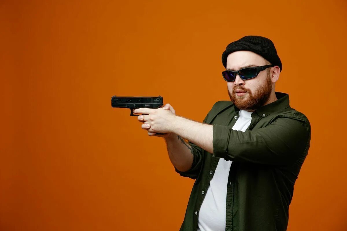Man with a gun. Walter pointing a gun. guy points gun at the same guy.