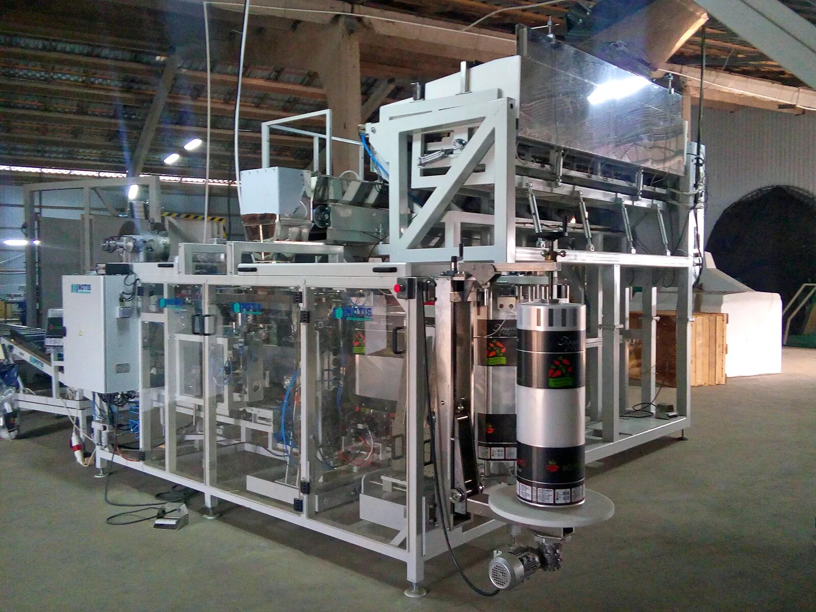 упаковочный аппарат нотис. фасовочно-упаковочный автомат дой пак. линия фасовки мешков 50 кг. линия фасовки в открытые мешки. линия фасовки альтер 04.