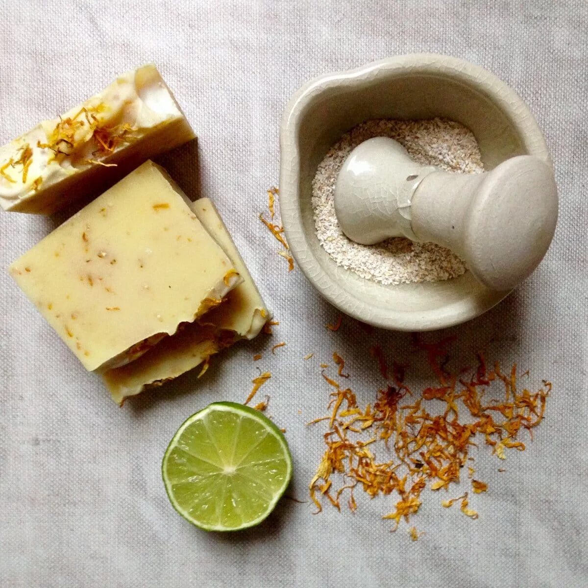 Making soap made. Soap making. ancient soap. knolling soap. hands with natural soap bar.