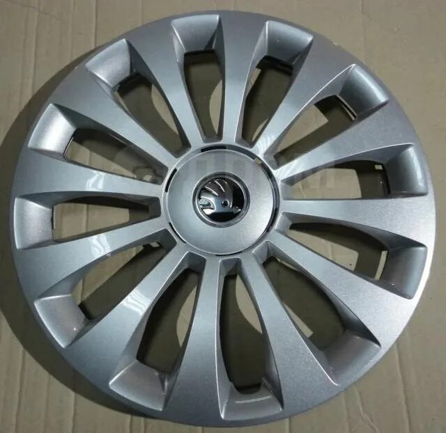 Колпачки шкода рапид. Оригинальные колпаки Шкода r15. Колпаки Skoda Octavia r15. Колпаки на колеса r15 Шкода. 5ja 601 147 c.