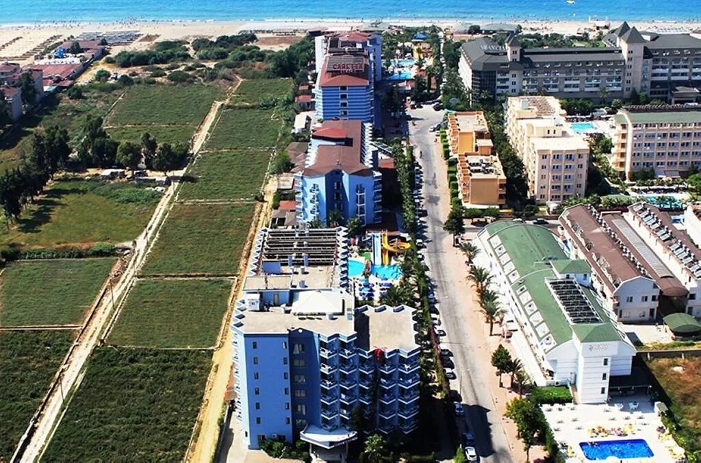 Отель в турции caretta relax hotel 4. Caretta relax hotel (ex. Caretta relax hotel 4 турция. Caretta relax hotel номера. Relax beach hotel 4 турция алания.