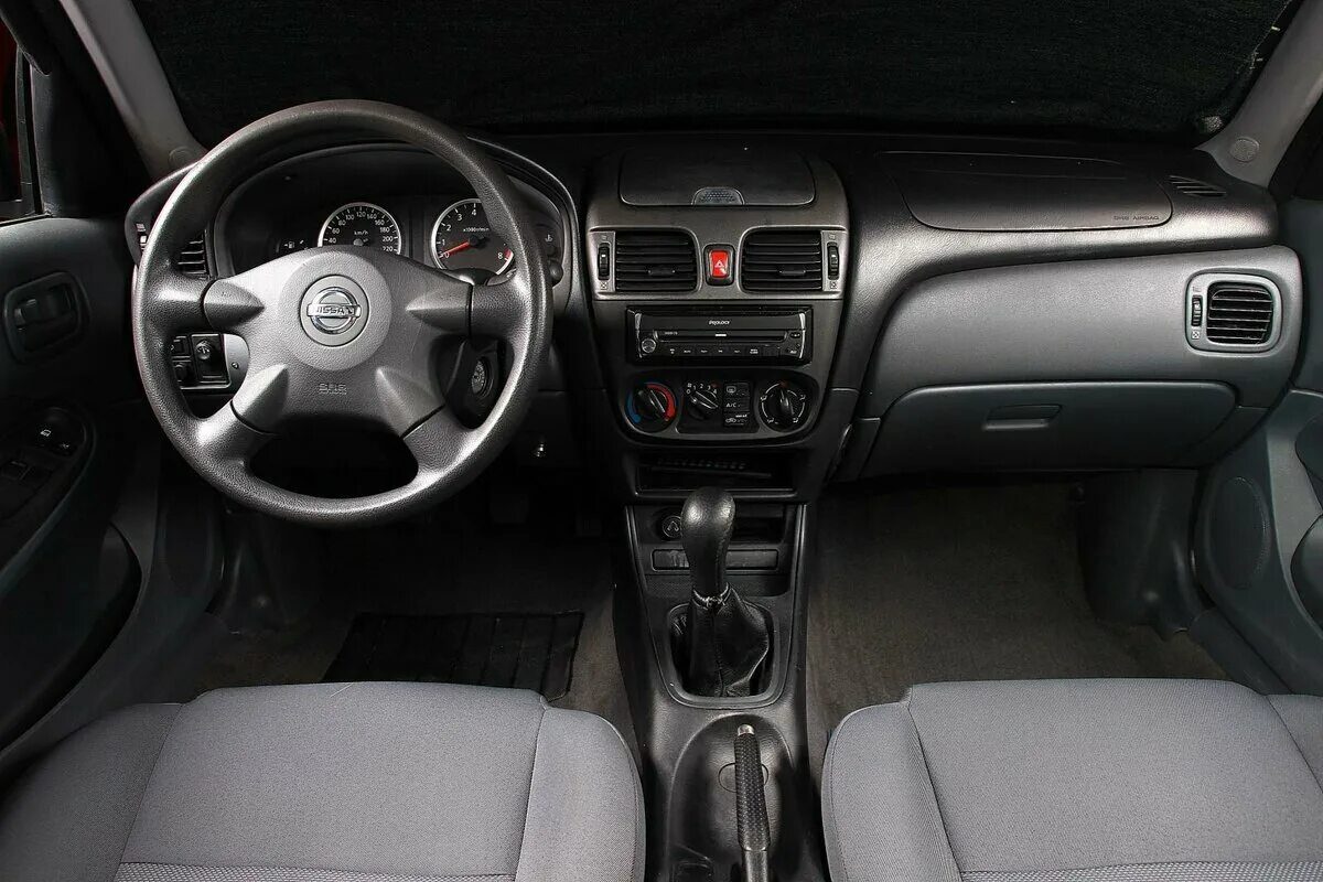 Комплектация nissan almera n16. Nissan almera n16 салон. Ниссан альмера 1. Nissan almera n16 салон. Almera n16 салон.
