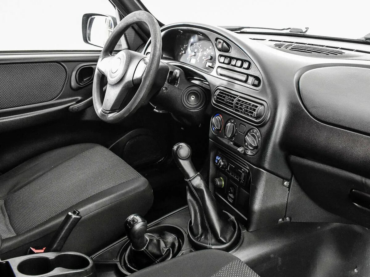 Салон нива москва. Chevrolet niva 2008 салон. chevrolet niva 2002 салон. нива шевроле 2008 салон. chevrolet niva 2012 салон.