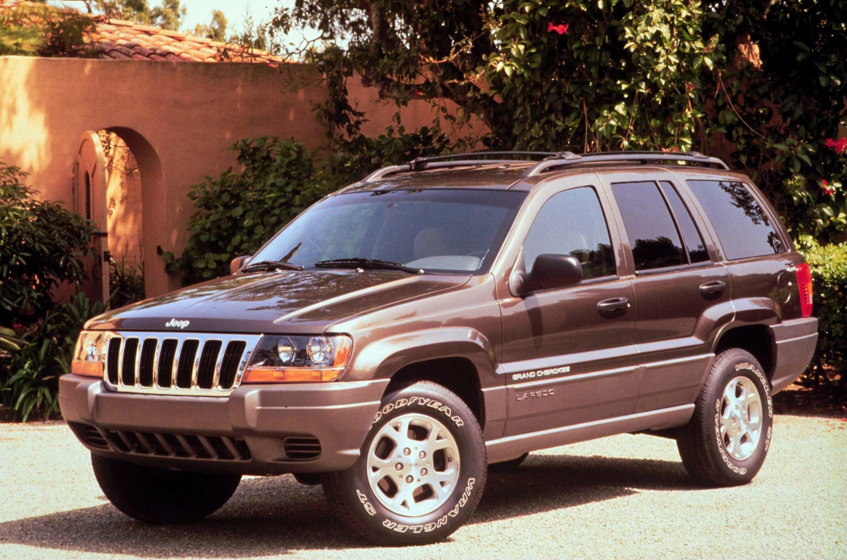 Джип гранд чероки wj купить. Jeep Grand Cherokee 1999. Jeep Grand Cherokee 2001. Jeep Grand Cherokee Laredo 1999. Jeep Grand Cherokee 1996.