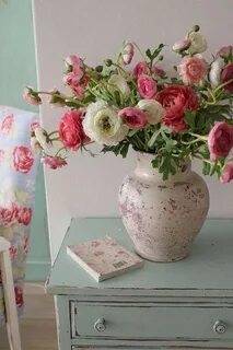 The vase is on the table