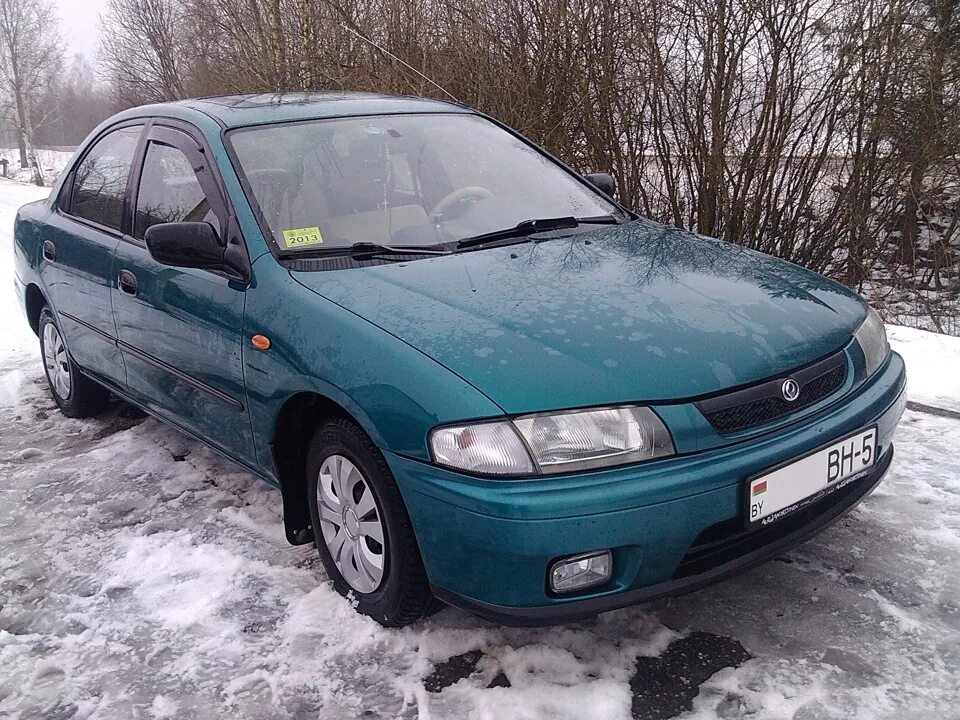 Мазда 323 1997. Mazda 323 v. Мазда 323 седан 1997. Mazda 323 1997. Мазда 323 хэтчбек 1997.