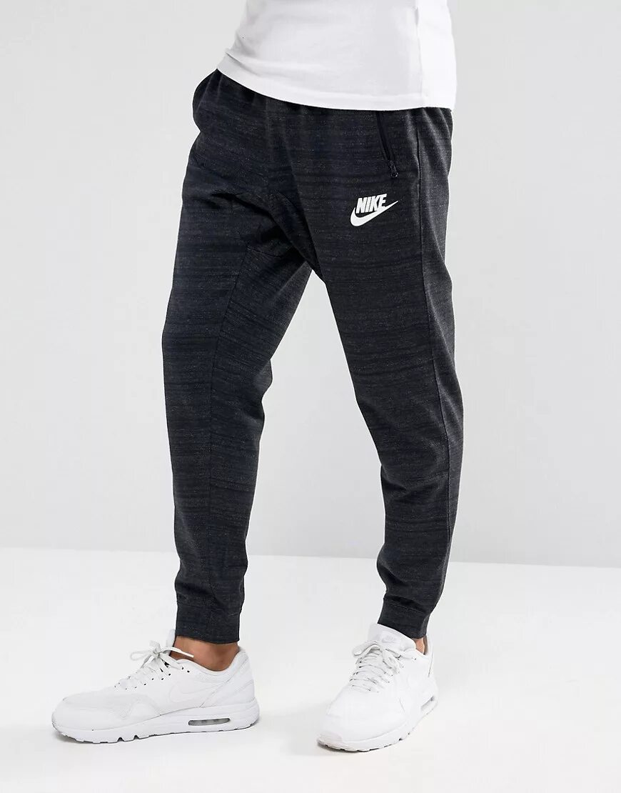 штаны найк на флисе черные. брюки nike мужские cd3129-010. брюки nike nsw jggr wvn core street. Nike golf штаны мужские. черные штаны найк.