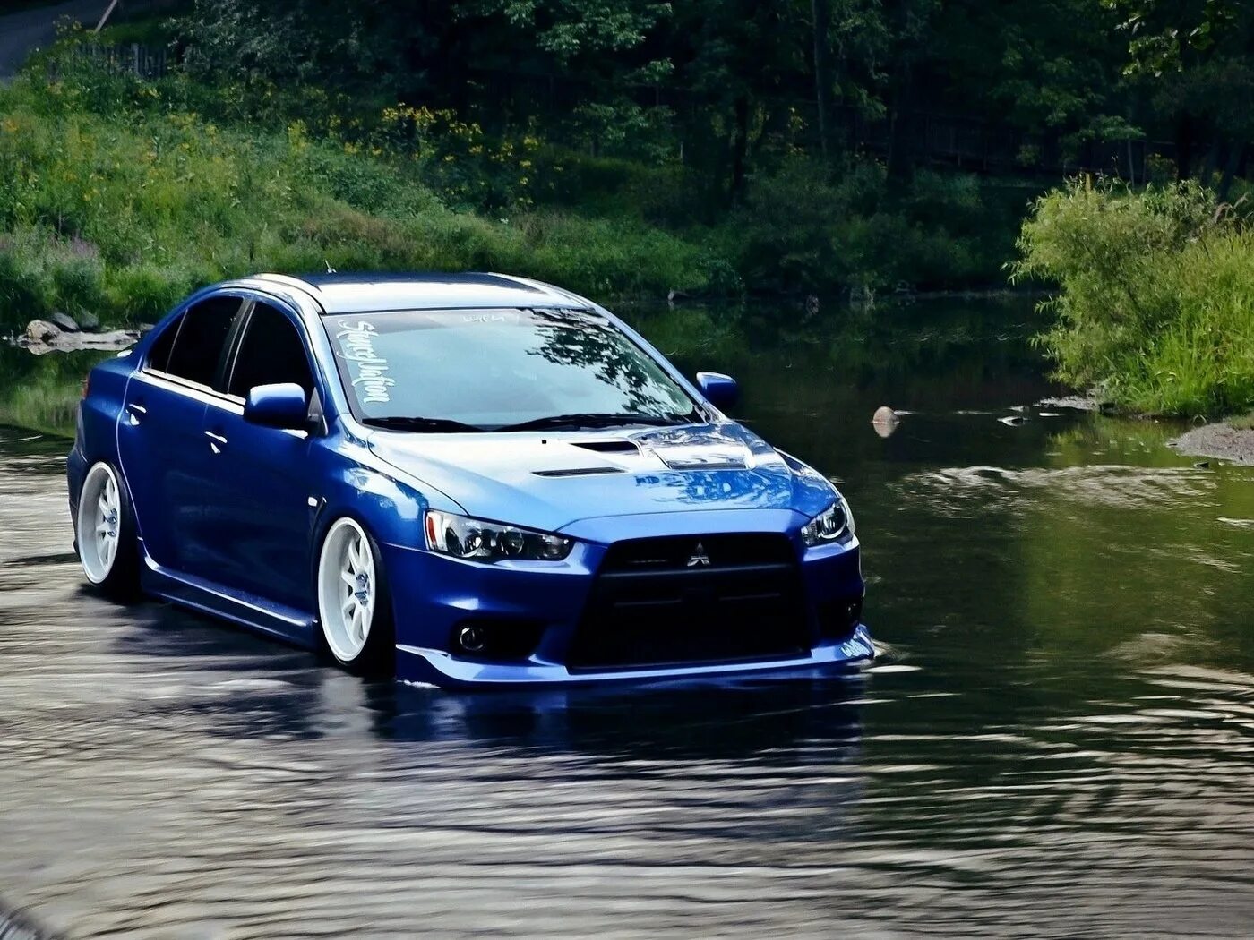 Mitsubishi evo x. Митсубиси Лансер Эволюшн. Lancer Evolution 10. Митсубиши Лансер 10. Mitsubishi Lancer Evolution x.