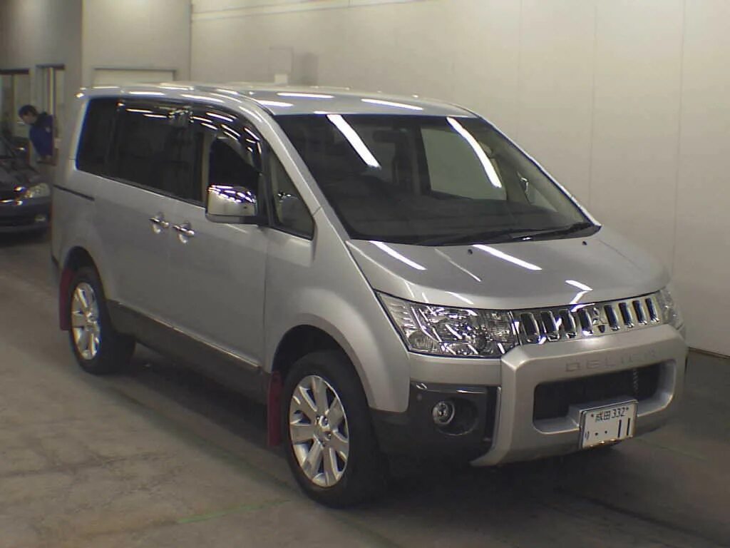 Delica d5 левый руль. Митсубиси делика д5 с левым. Mitsubishi delica d:5. Машина митсубиси делика d5. Митсубиси делика д5.
