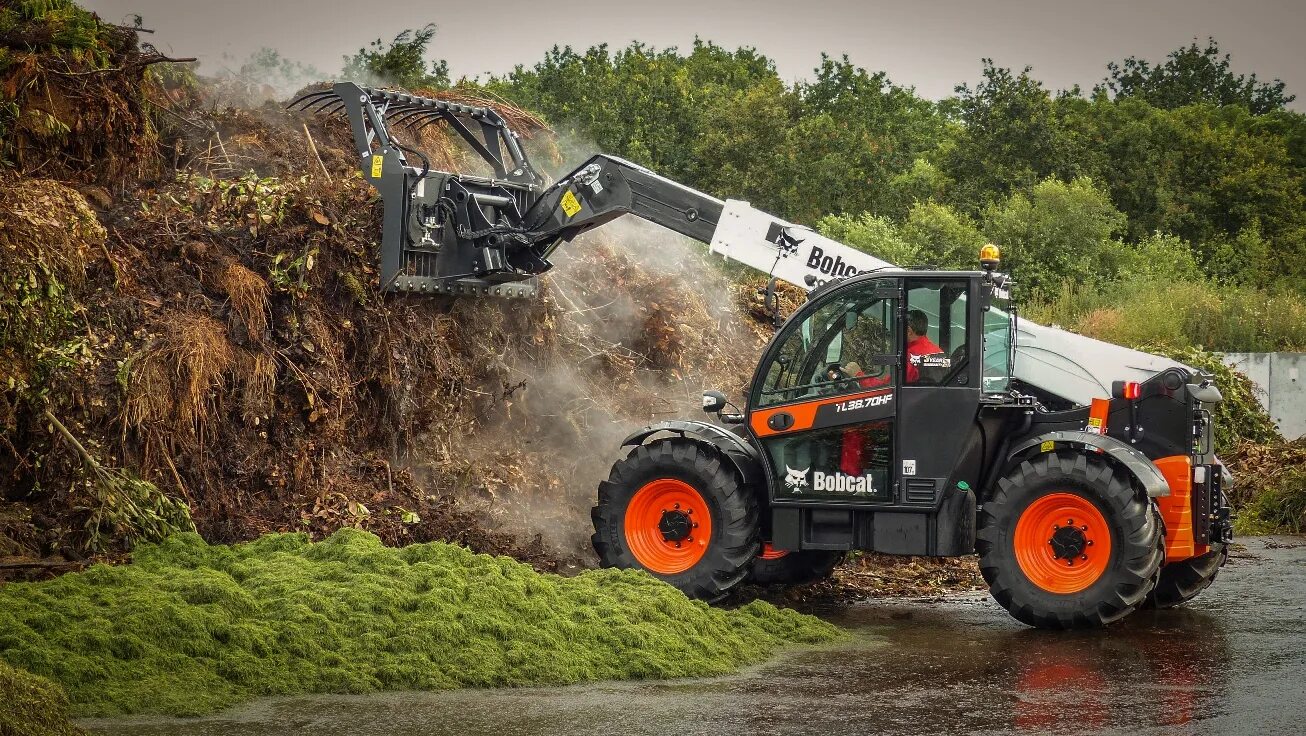 Телескопический погрузчик bobcat. Телескопический погрузчик Bobcat TL35.70. Bobcat TL38.70HF. Погрузчик Bobcat TL38.70X. Бобкет сайт 38.70.