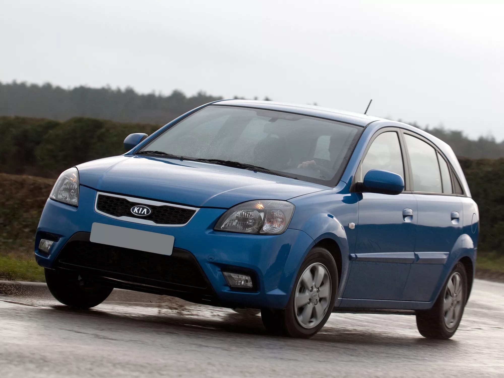 Kia Rio 2009. Киа Рио 2 поколения хэтчбек. Kia Rio Hatchback 2009. Kia Rio 2 Hatchback.