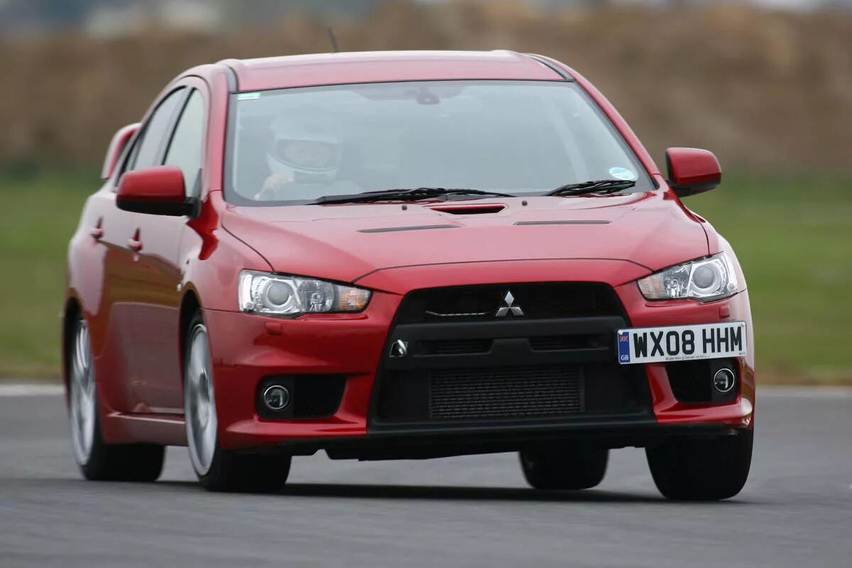 Lancer 10 поколения. Mitsubishi Lancer Evolution 10. Митсубиси революшен 10 Лансер. Митсубиси Эво 10 поколения. Mitsubishi Lancer Evolution x.