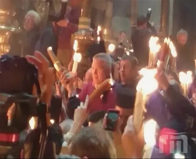 Момент схождения благодатного огня видео. Схождения благодатного огня на гроб господня видео. Благодатный огонь 2022 в иерусалиме. Схождение благодатного огня в иерусалиме 2023. Момент схождения благодатного огня видео.