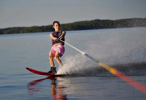 He is water skiing