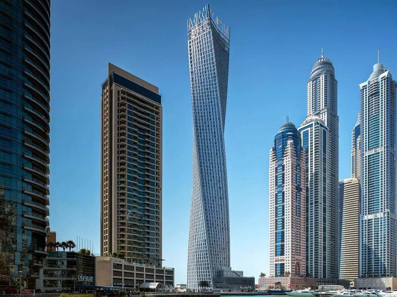 Как называются здания в городе. Башня Кайан Дубай. Дубай товерс Дубай. Дубай Сити Тауэр. Небоскреб Дубай Сити Тауэр.