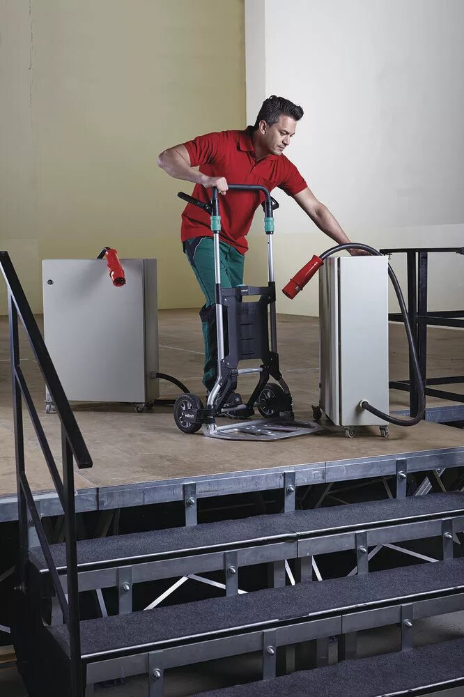 Подъем груза по ступенькам. Двухколесная тележка специализированная кб 1 цепь. Подъемник по ступенькам для груза. Лестничная тележка 200кг. Тележка для подъема груза по лестнице.