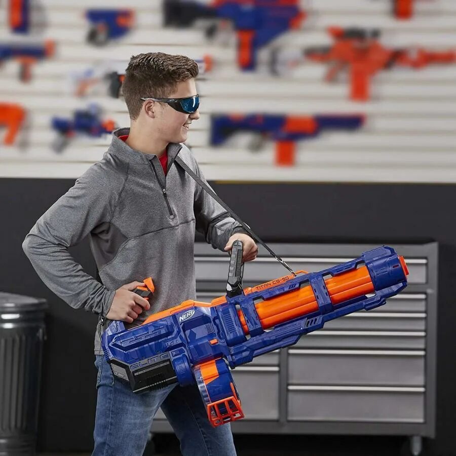 Нерф самый. Бластер нерф элит титан e2865. nerf elite titan cs-50. nerf titan cs-50 minigun. нерф элит титан миниган.