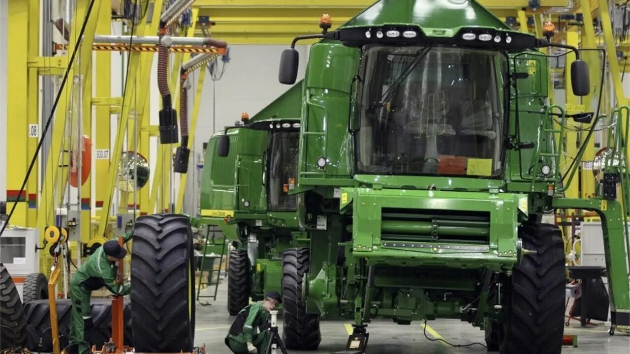 Работа джон дир. John deere w540. завод john deere. завод john deere оренбург. харвестер джон дир.