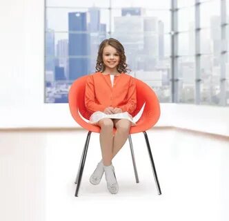 Girl sits on chair