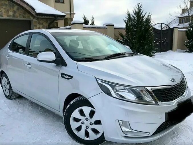 Купить киа рио в россии. Kia Rio 2013 серебристый. Kia Rio 2014 серебристый. Киа Рио серебристая 2013. Kia Rio 2015 серебристый.