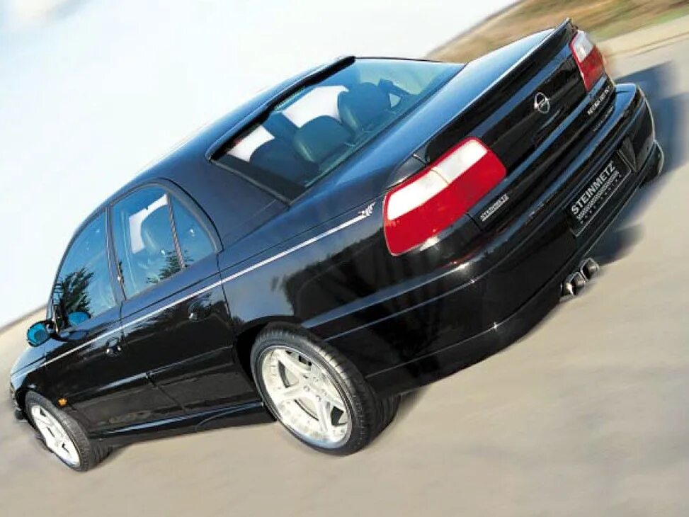 Накладки на пороги опель омега а артикул. Opel omega b steinmetz. Opel omega b рестайлинг. Обвес steinmetz opel omega b. Opel omega b 94-99.
