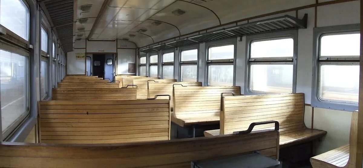 Поезд 557х отзывы. Эр2т салон с деревянными скамейками. Эр1 салон. Эр2т салон. Эр2 0001 салон.