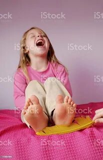 Tickling feet in stock