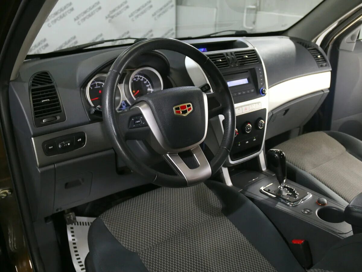 Geely emgrand 2015. Geely emgrand x7 2015 салон. geely emgrand 7. geely emgrand x7 салон. эмгранд х7 седан.